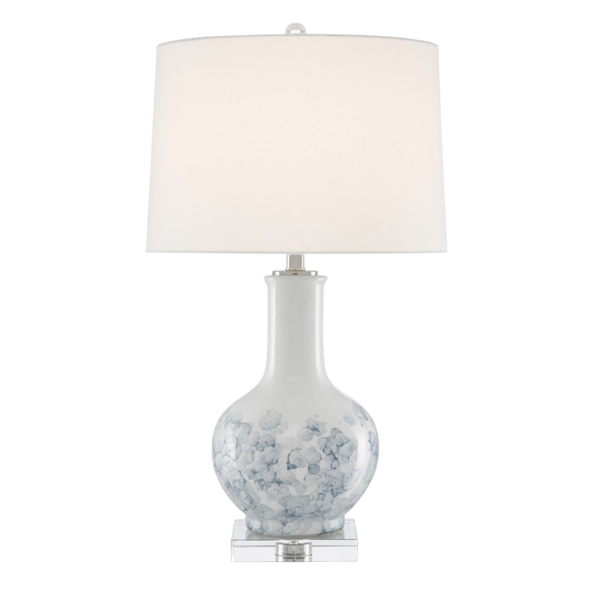 Table lamp with white shade and decorative base on a white background